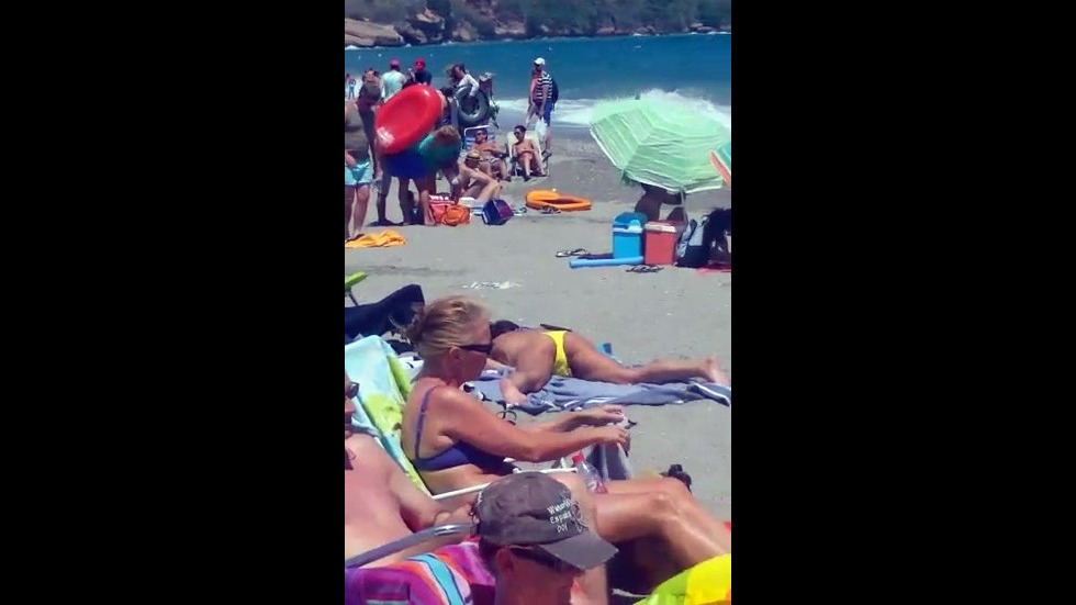 Eyed a lady jerking on a public beach