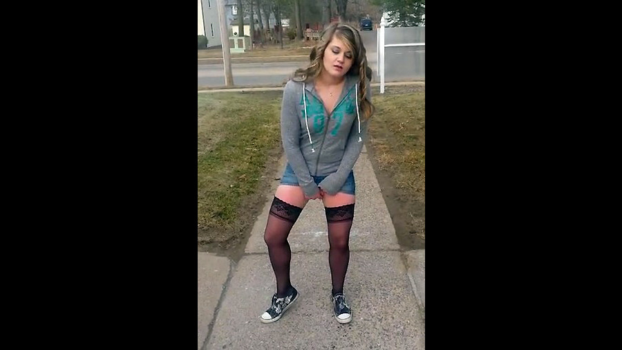 Young lady in tights and sneakers pounds